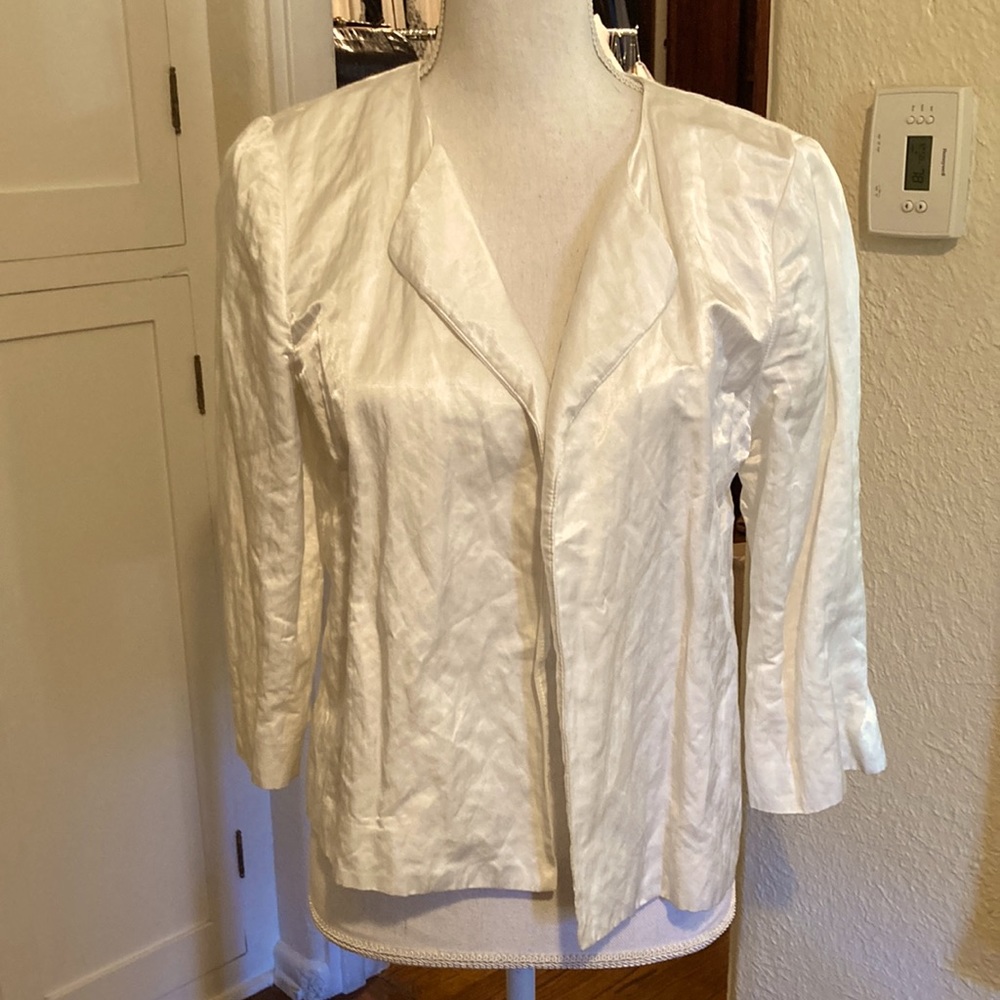this cute white Eileen Fisher size 2 never really fit me well.